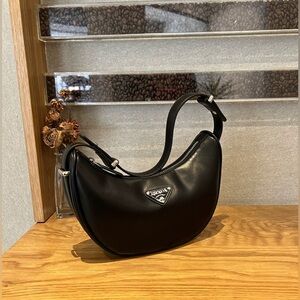 Brand new crescent cowhide bag
